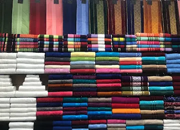 ABDUL AZIZ JASSEM TEXTILES (L.L.C)