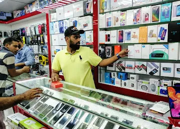 AL QASR AL ASFAR MOBILE PHONES & ELECTRONIC TR