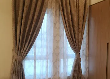 Al Zelal Curtains and Carpets Establishment