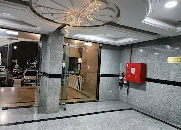 Aman Building