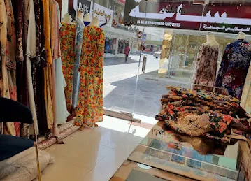 دار خنجي للأقمشة و الملابس الجاهزة