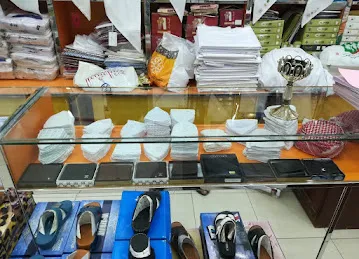 FAJAR AL AROOBA TEXTILES & GENTS TAILORING فجر العروبة للأقمشة والخياطة الرجالية