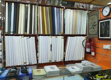 FAJAR AL AROOBA TEXTILES & GENTS TAILORING فجر العروبة للأقمشة والخياطة الرجالية