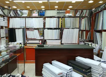 FAJAR AL AROOBA TEXTILES & GENTS TAILORING فجر العروبة للأقمشة والخياطة الرجالية