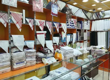 FAJAR AL AROOBA TEXTILES & GENTS TAILORING فجر العروبة للأقمشة والخياطة الرجالية