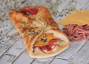 Fatayer Ala Al Tayer Cafeteria And Restaurant