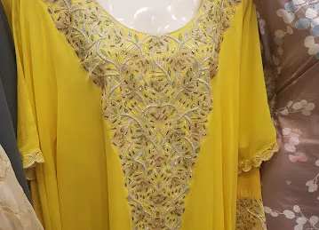 خياط نور الواحة اذياء السيدات OASIS NOOR LADIES FASHION TAILORING