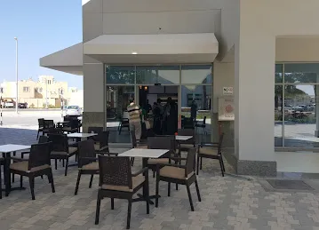 البيتزا الفلاح جانب المسجد خ