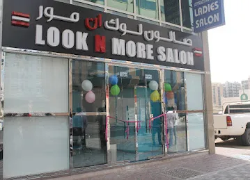LOOK N MORE GENTS SALOON