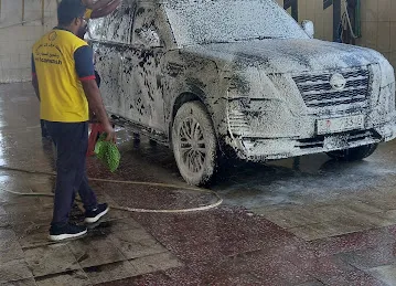محطة تربل ون لغسيل و تلميع السيارات