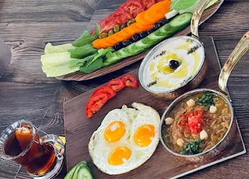 ( مطعم البوادي ) AlBawadi Restaurant & Café