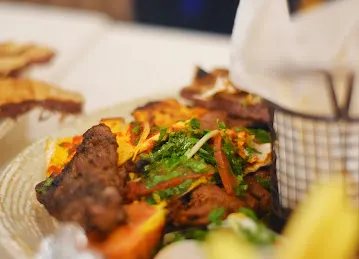 ( مطعم البوادي ) AlBawadi Restaurant & Café