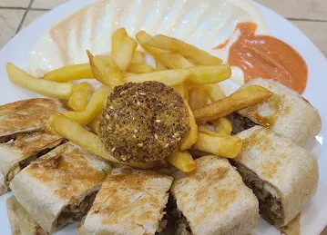 مطعم الروضة Al Rowdha Restaurant