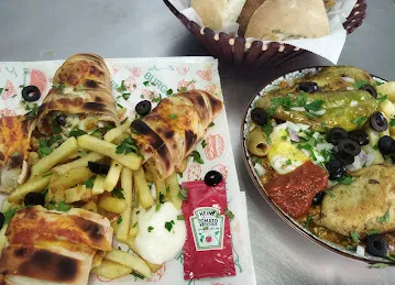 مطعم و مقهى الڨدومي