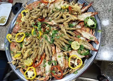 مطعم و مطبخ النخيل الشعبي