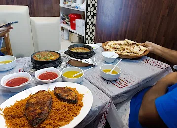مطعم ومطبخ الهجرين للمندي و المظبي Al Hajrain Restaurant & Kitchen