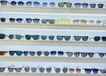 Opto Vision Sunglasses frames contact lenses eye testing optical store at Abudhabi