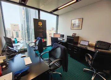 Quantum Global Solutions LLC - Abu Dhabi Branch
