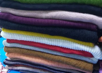SI TEXTILES FZC