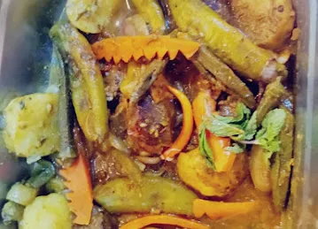 Spicy Village Cafeteria and Restaurant DWC LLC