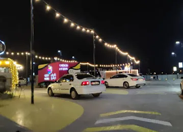 Spot - Food Trucks Park in Shamkha - سبوت - حديقة عربات الطعام في الشامخة