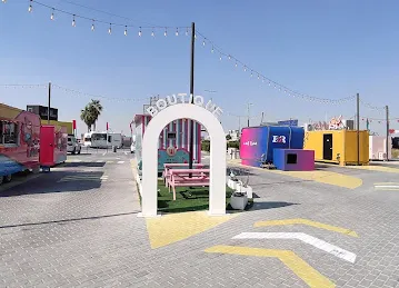 Spot - Food Trucks Park in Shamkha - سبوت - حديقة عربات الطعام في الشامخة