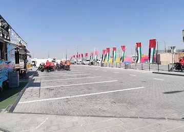 Spot - Food Trucks Park in Shamkha - سبوت - حديقة عربات الطعام في الشامخة