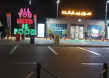 Spot - Food Trucks Park in Shamkha - سبوت - حديقة عربات الطعام في الشامخة