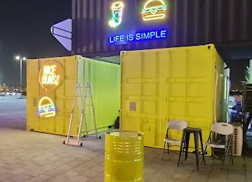 Spot - Food Trucks Park in Shamkha - سبوت - حديقة عربات الطعام في الشامخة