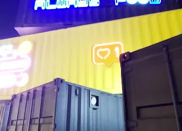 Spot - Food Trucks Park in Shamkha - سبوت - حديقة عربات الطعام في الشامخة