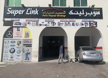 Super link auto repair Work shop oil , engine and paint Garage Abu dhabi.-ورشه سوبر لينك كراج،طلاء زيت انجن و تلوين ابو ظبي