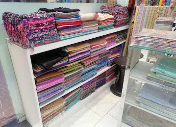 TAWAKUL PAKISTANI STORES محلات توکل الباکستانی