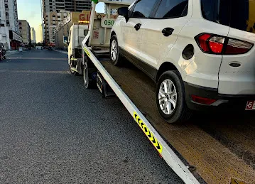 Usama best car recovery/towing Service near me Sharjha/Dubai Qusais Deira downtown business bay jumeirah