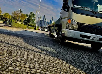 Usama best car recovery/towing Service near me Sharjha/Dubai Qusais Deira downtown business bay jumeirah