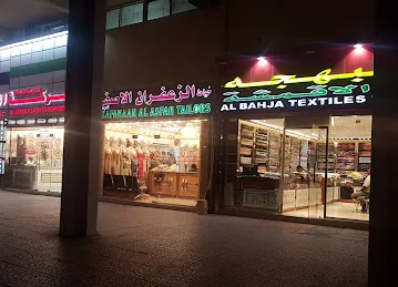 Zakher tailors